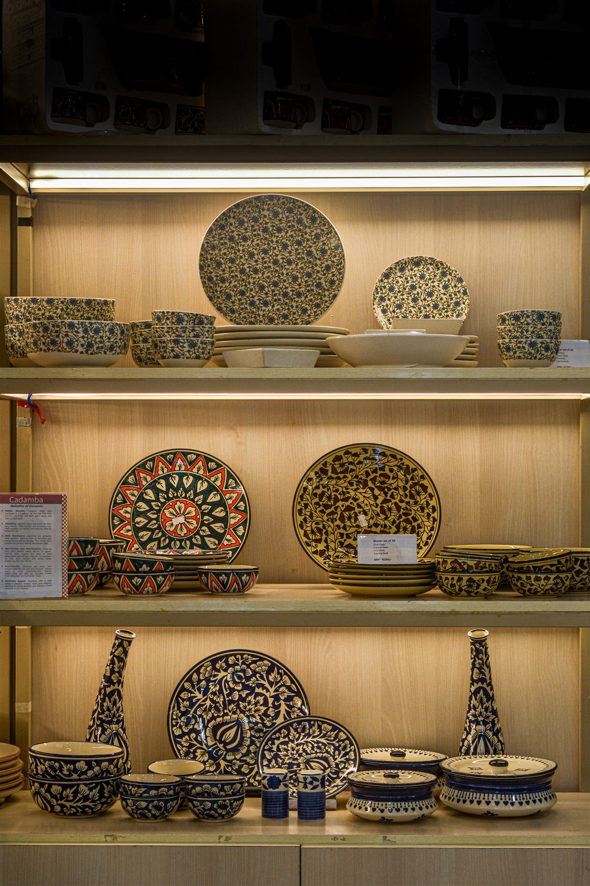 Detail of Cadamba ceramic dinnerware on display